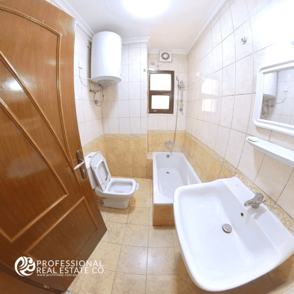 Modern bathroom in Unfurnished 3 BHK Apartment in Al Sadd, near Avenue Hotel, ideal for bachelors or families.