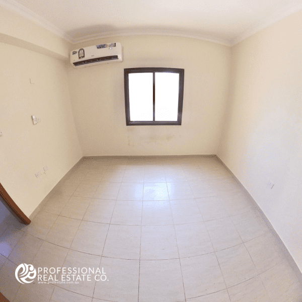 Third bedroom of Unfurnished 3 BHK Apartment in Al Sadd, Near Avenue Hotel, ideal for bachelors or families.