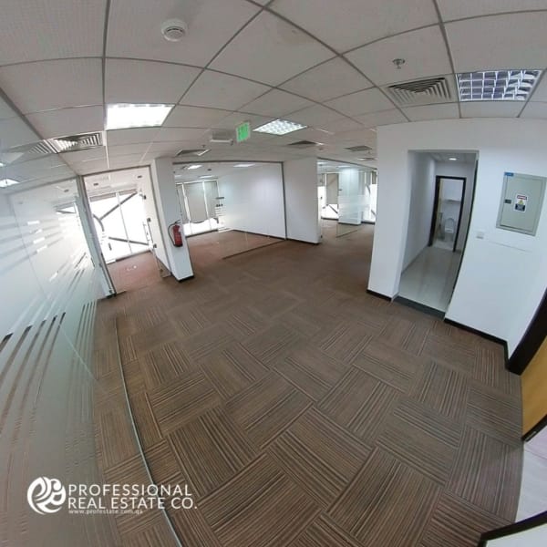 Spacious hallway in an unfurnished office open space in Bin Mahmoud, offering easy access to workspaces and facilities