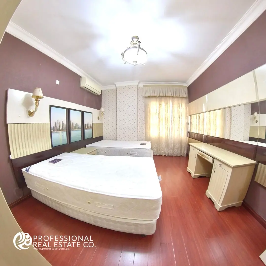 Fully furnished bedroom in 2 BHK apartment in Mansoura – Cozy, stylish, and perfect for a restful night