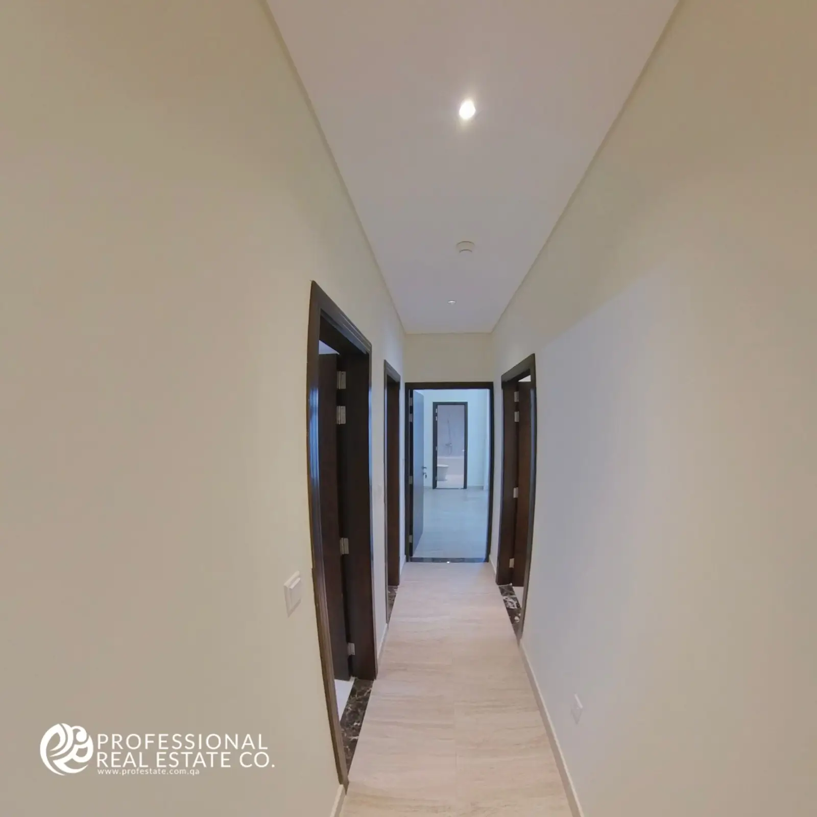 Hallway of the fully furnished 2 BHK apartment in Giardino The Pearl.