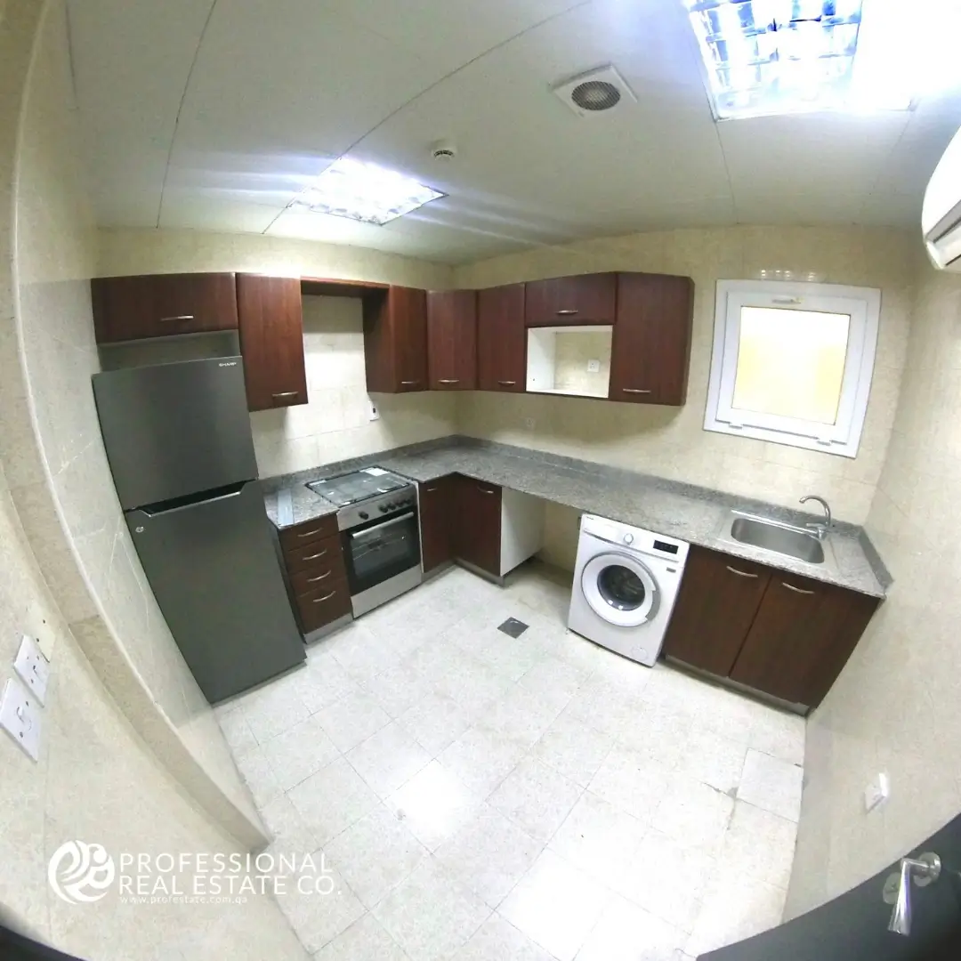 Fully equipped kitchen in the furnished 3 BHK apartment.