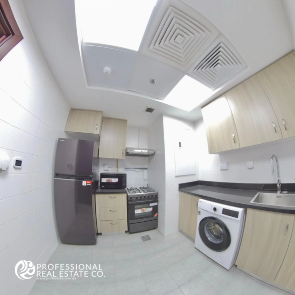 kitchen and sink in the 2 BHK apartment in Lusail.