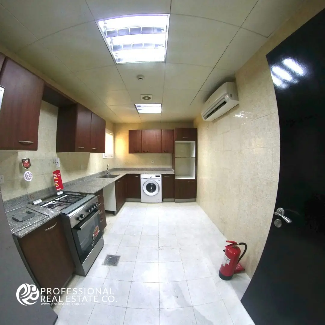 Modern kitchen in 2 BHK apartment for rent in Al Naser, Doha – Fully furnished with high-end appliances