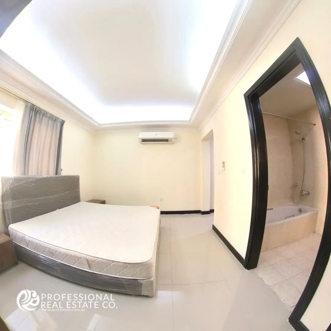 Master bedroom in the fully furnished apartment with elegant decor.