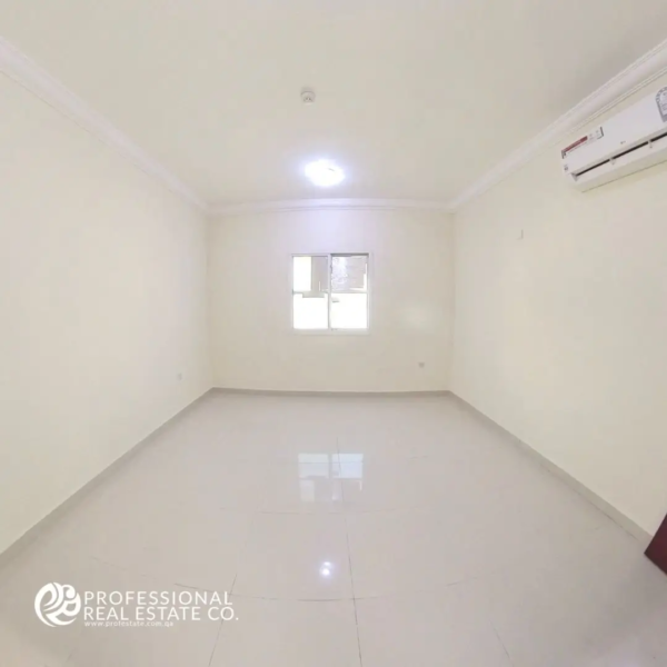 Unfurnished primary bedroom in 3 BHK apartment for rent in Muntazah, near B Ring Road – Bright, spacious with large windows and closet space