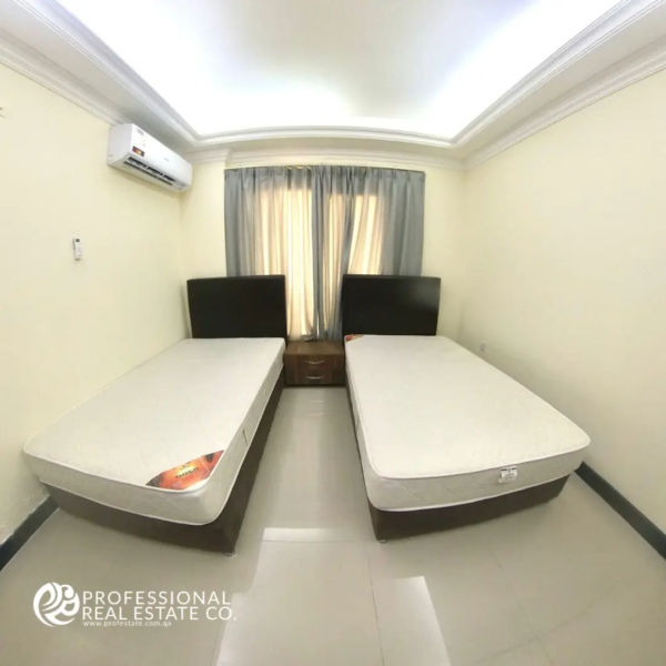 Second bedroom in the fully furnished 3 BHK apartment.