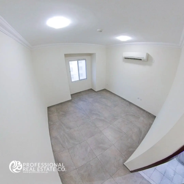 Bright and Spacious Second Bedroom in Unfurnished 3 BHK Apartment in Muntazah