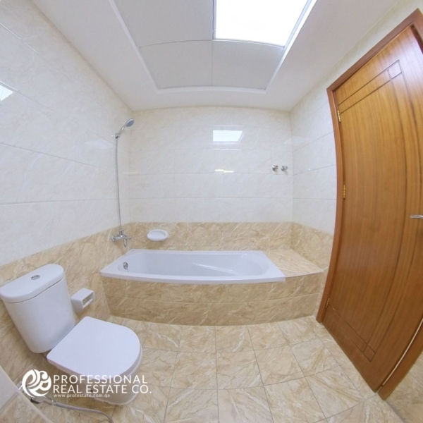 Modern bathroom in a fully furnished 2 BHK apartment in Bin Mahmoud, featuring high-quality fixtures and stylish design.