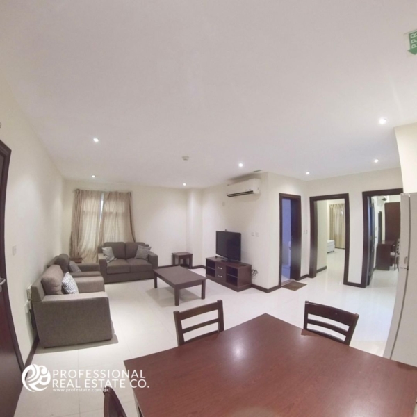 Dining area in fully furnished 2 BHK apartment in Najma with modern furniture and spacious layout.