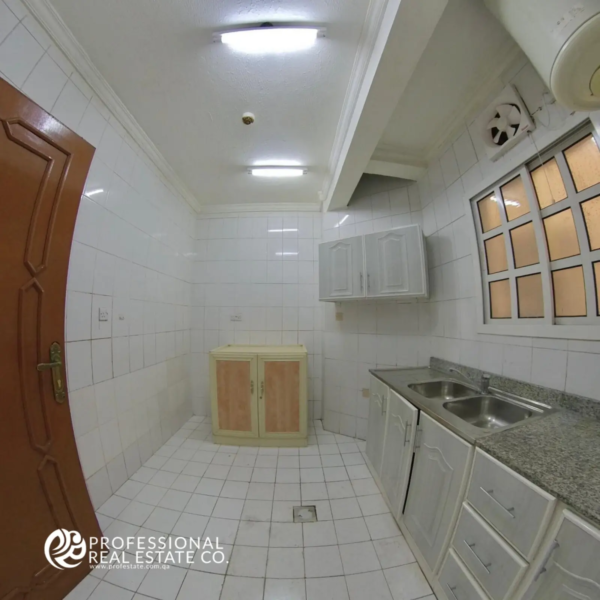 Kitchen in unfurnished 2 BHK apartment in Najma, featuring spacious layout and ready for customization with ample storage space.