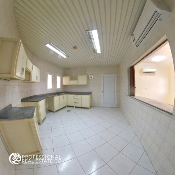 Modern kitchen in an unfurnished 5 BHK standalone villa in Al Waab, perfect for family living.