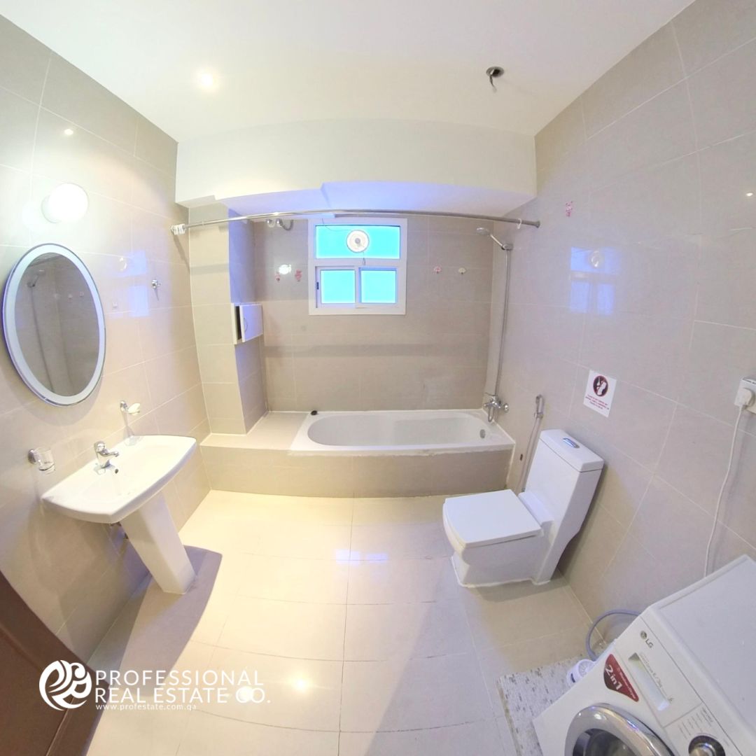 Second bathroom in fully furnished 2 BHK apartment in Najma with stylish design, modern fixtures, and ample space.