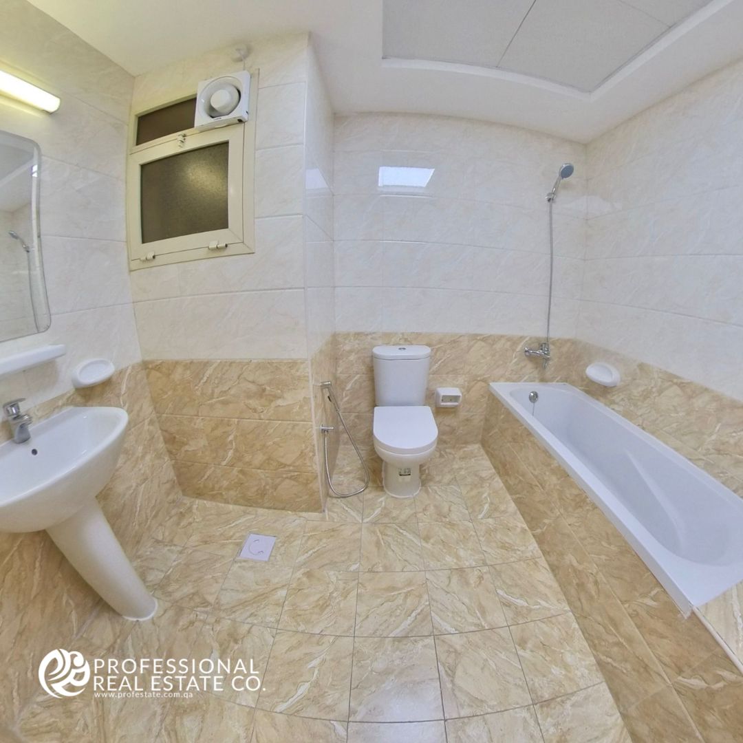 Modern second bathroom in a fully furnished 2 BHK apartment in Bin Mahmoud, featuring high-quality fixtures and stylish design.