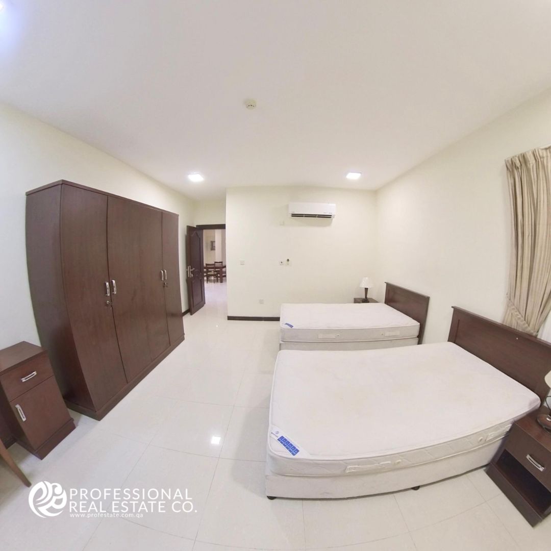 Spacious primary bedroom in fully furnished 2 BHK apartment in Najma with modern décor, ample storage, and natural light.