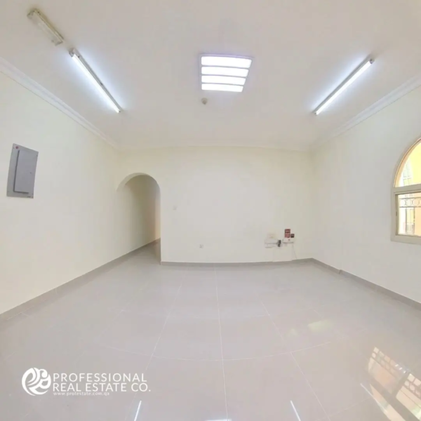 Spacious living space in an unfurnished 2 BHK apartment in Doha Jadeed, near New Doha Complex.