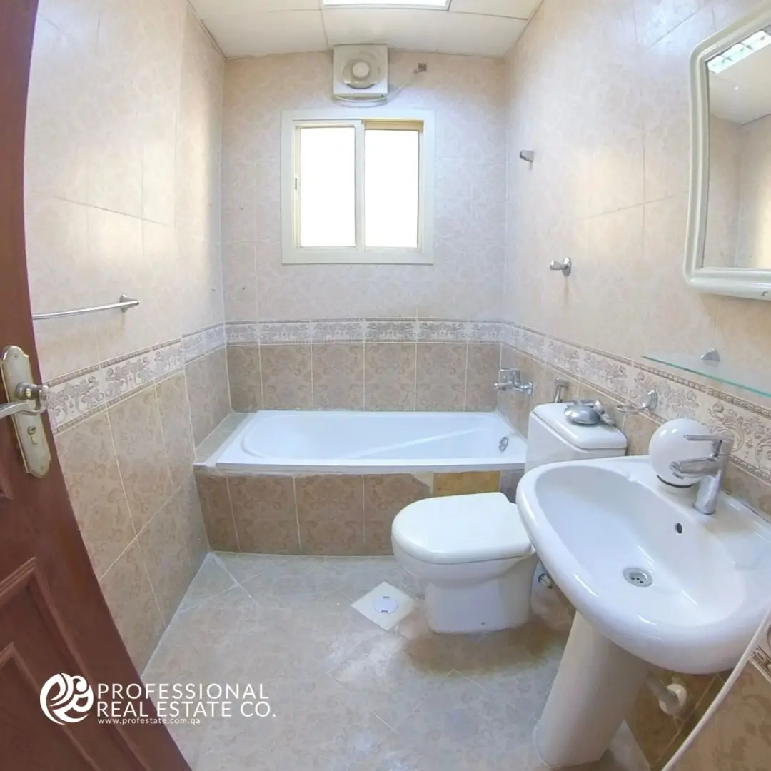 Modern bathroom in an unfurnished 2 BHK apartment in Doha Jadeed, near New Doha Complex.