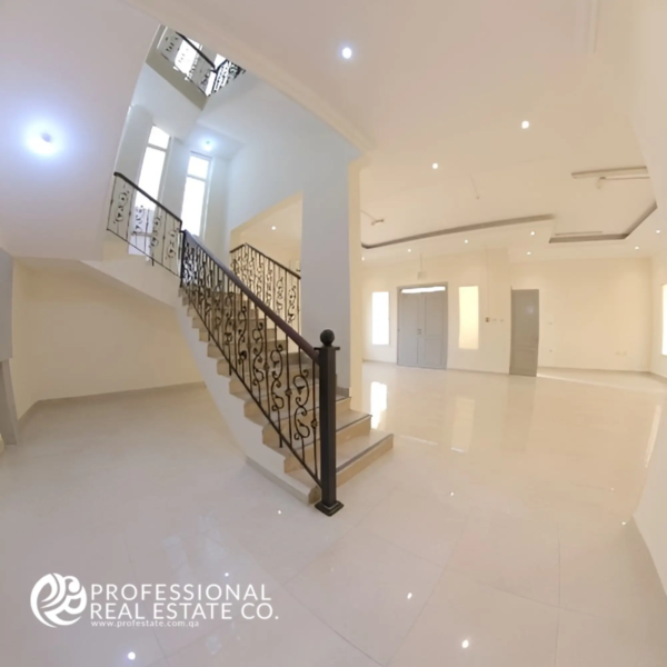 Beautiful staircase view in Unfurnished 6 BHK Standalone Villa in Umm Lekhba – Modern design and open, spacious layout.