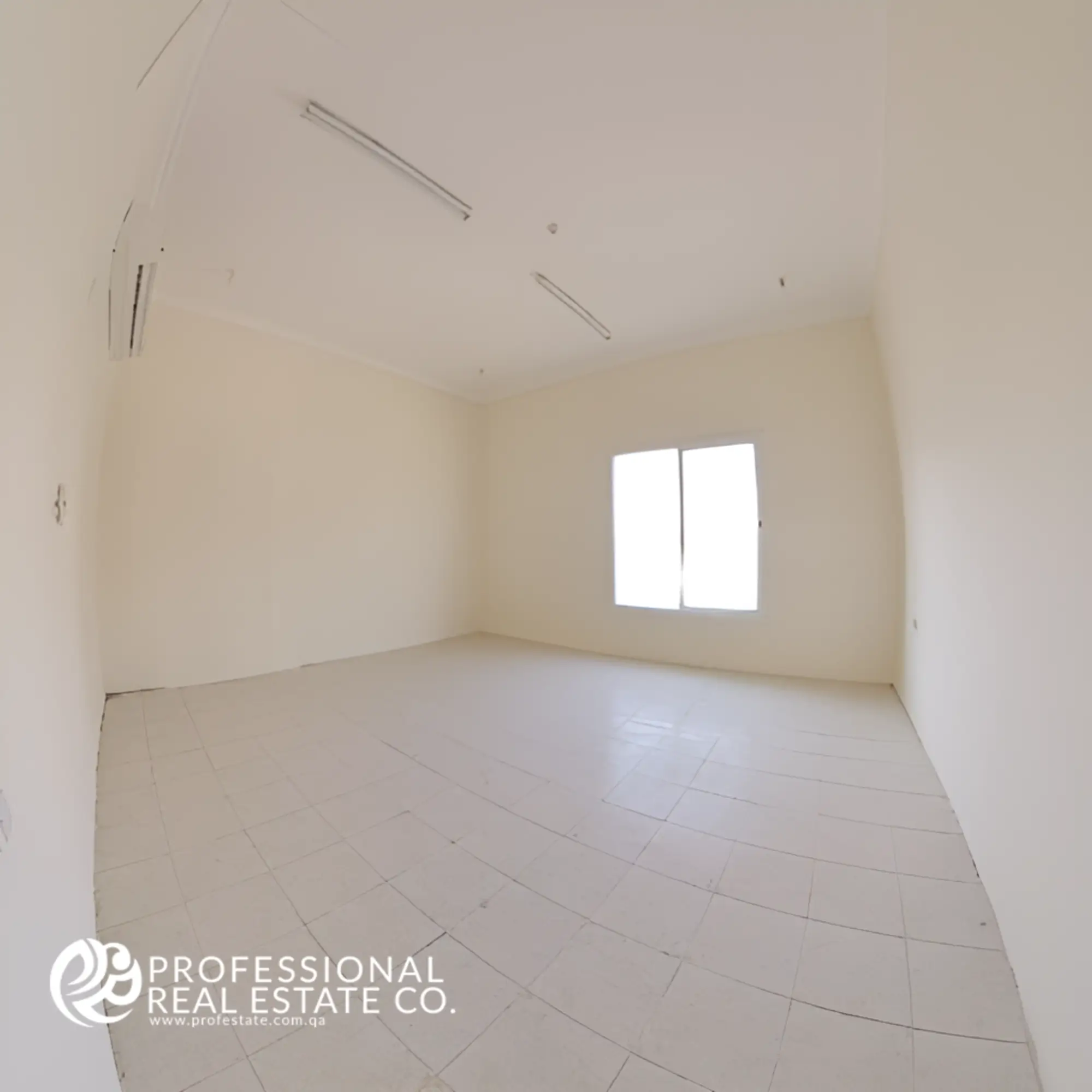 Spacious Bedroom 6 in Unfurnished 6 BHK Standalone Villa in Umm Lekhba – Bright, Versatile, and Ready for Personalization