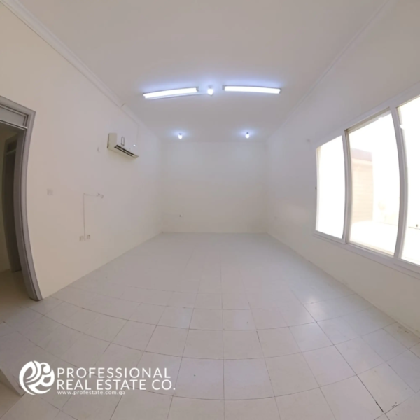 Spacious Bedroom 1 in Unfurnished 6 BHK Standalone Villa in Umm Lekhba – Bright and Versatile Space Ready for Personalization