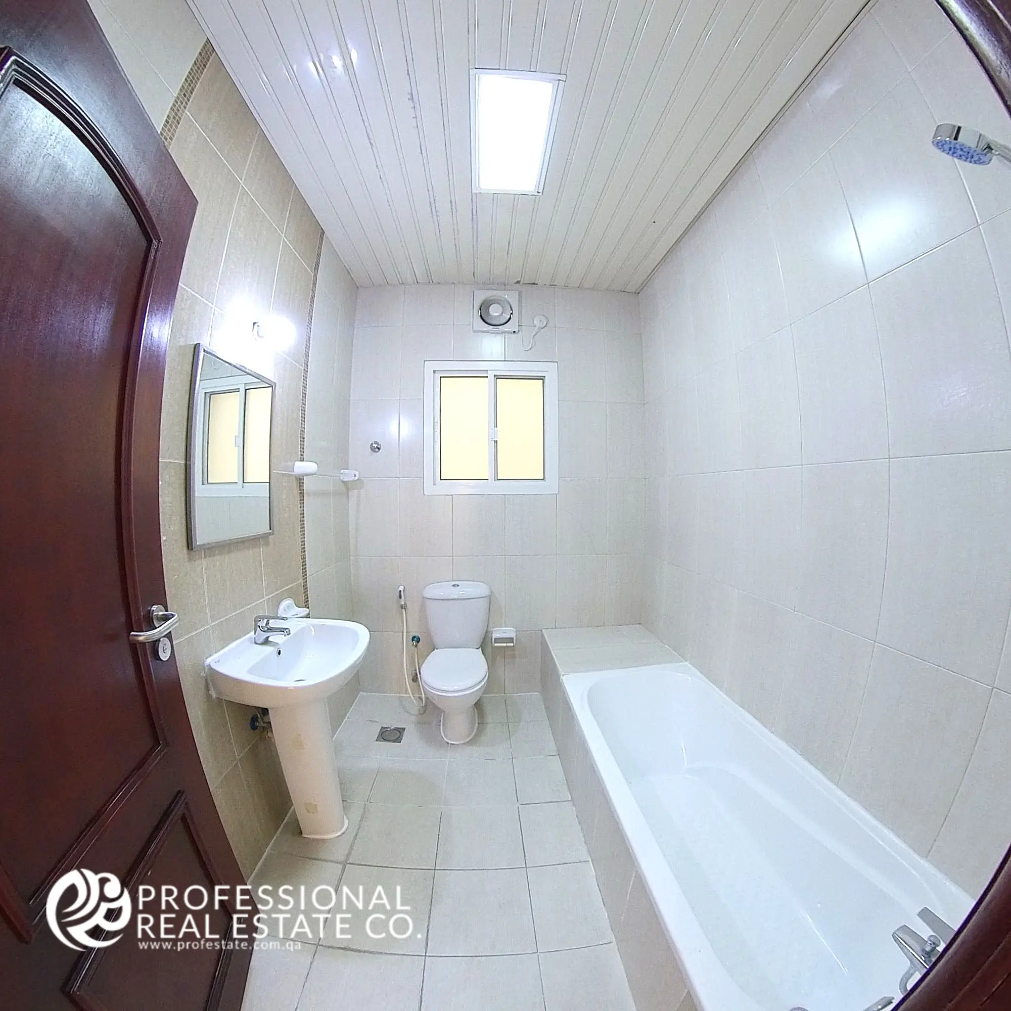 Well-designed second bathroom in an unfurnished 4 BHK apartment for rent in Al Naser, perfect for personalization and modern upgrades.