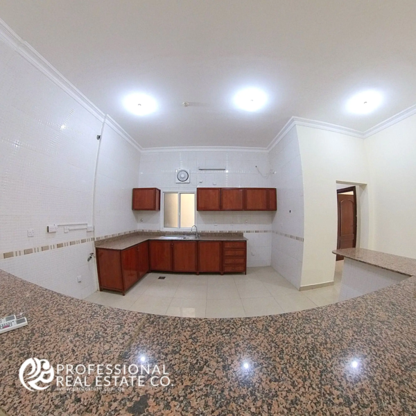 Alternative view of the open kitchen in an unfurnished 4 BHK apartment for rent in Al Naser, showcasing its spacious and customizable layout.