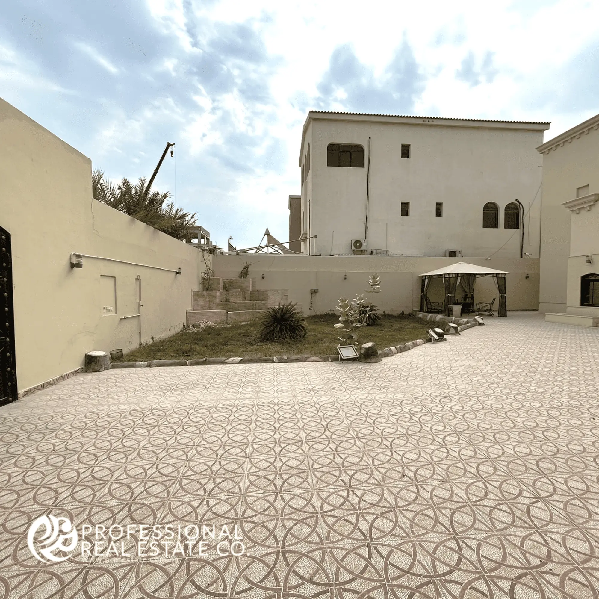 Stunning external view of the fully furnished 5 BHK standalone villa in Umm Lekhba, showcasing modern architecture and luxurious design.