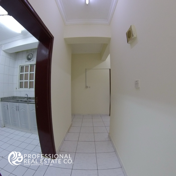 Spacious hallway in an unfurnished 2 BHK apartment in Najma, featuring a well-lit area that connects to the living spaces, offering potential for customization.