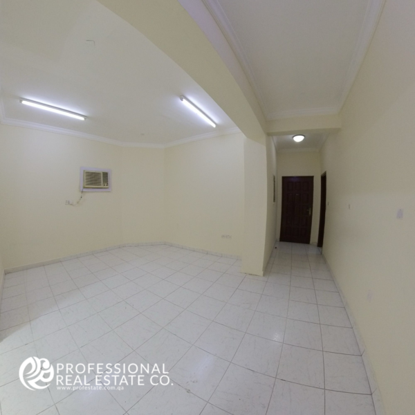 Inside view of the main door of an unfurnished 2 BHK apartment in Najma, showcasing a welcoming entrance leading to a spacious living area.