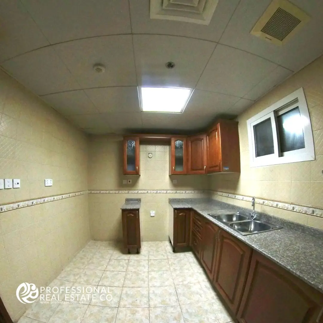 Modern closed kitchen in unfurnished 2 BHK apartment for rent in Bin Mahmoud – perfect for functional cooking space and customization.