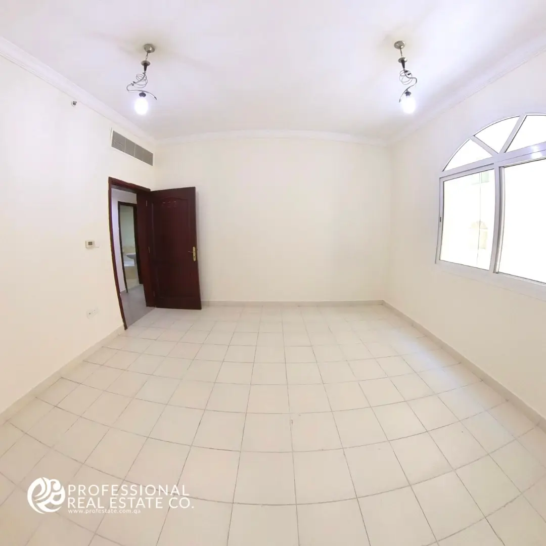 Comfortable living room in unfurnished 2 BHK apartment for rent in Bin Mahmoud – the perfect balance of space and functionality.