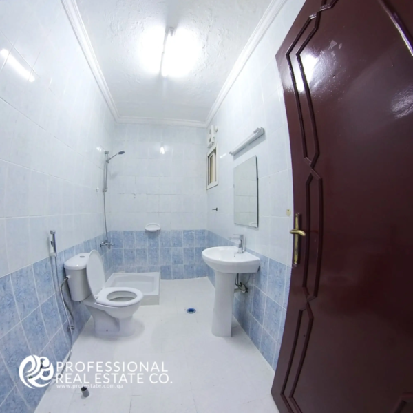 Modern tiled bathroom in unfurnished 2 BHK apartment for rent in Najma, Doha