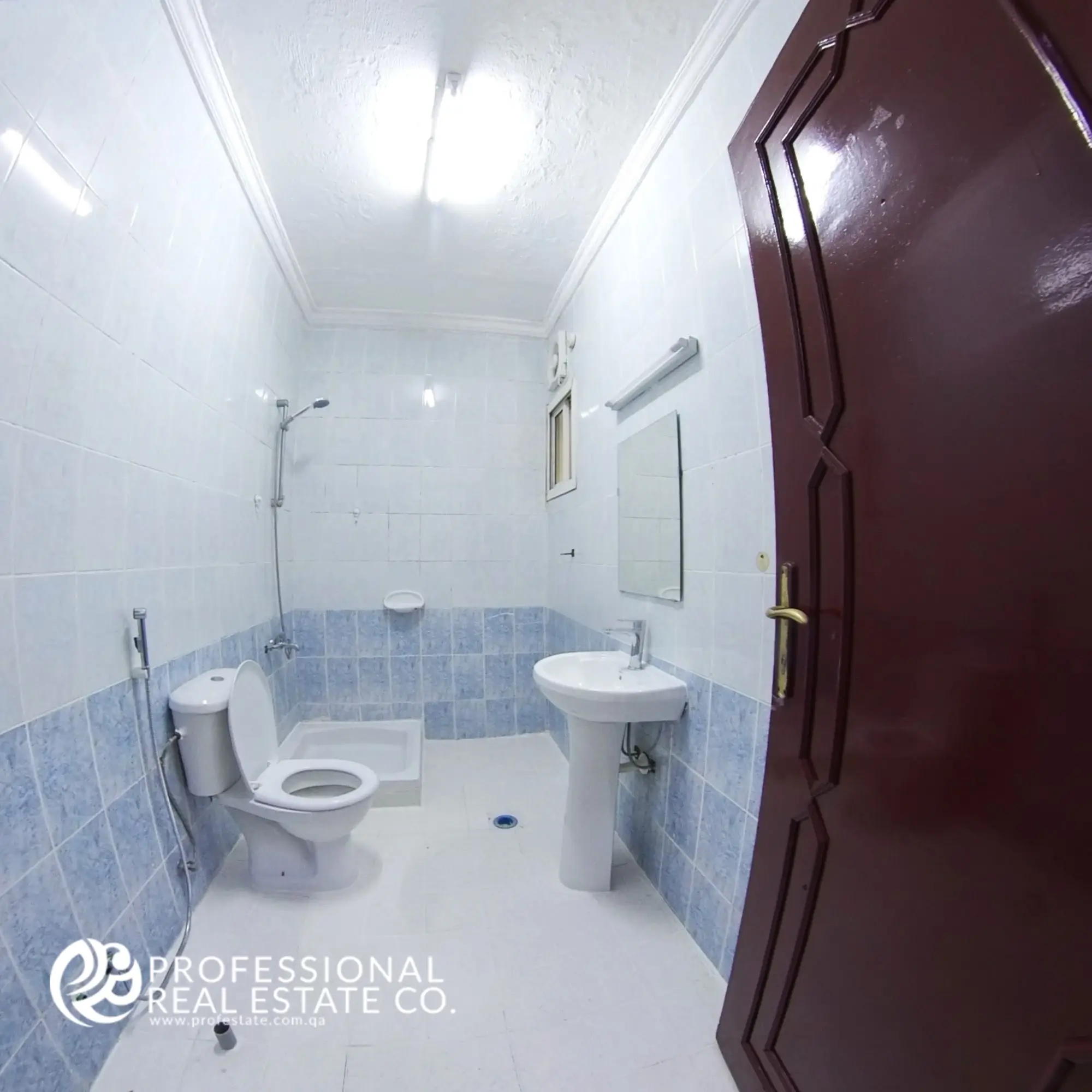 Modern tiled bathroom in unfurnished 2 BHK apartment for rent in Najma, Doha