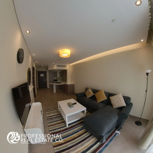 Living room in a fully furnished 1 BHK apartment in Al Sadd, featuring modern furnishings, open layout, and abundant natural light.