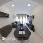View of the dining and living area facing the window with natural light in a fully furnished 1 bedroom apartment in Bin Omran, Doha