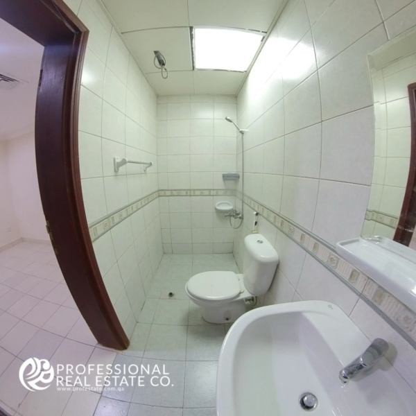 Second toilet with shower compartment in an unfurnished 3 BHK apartment in Bin Mahmoud, Doha