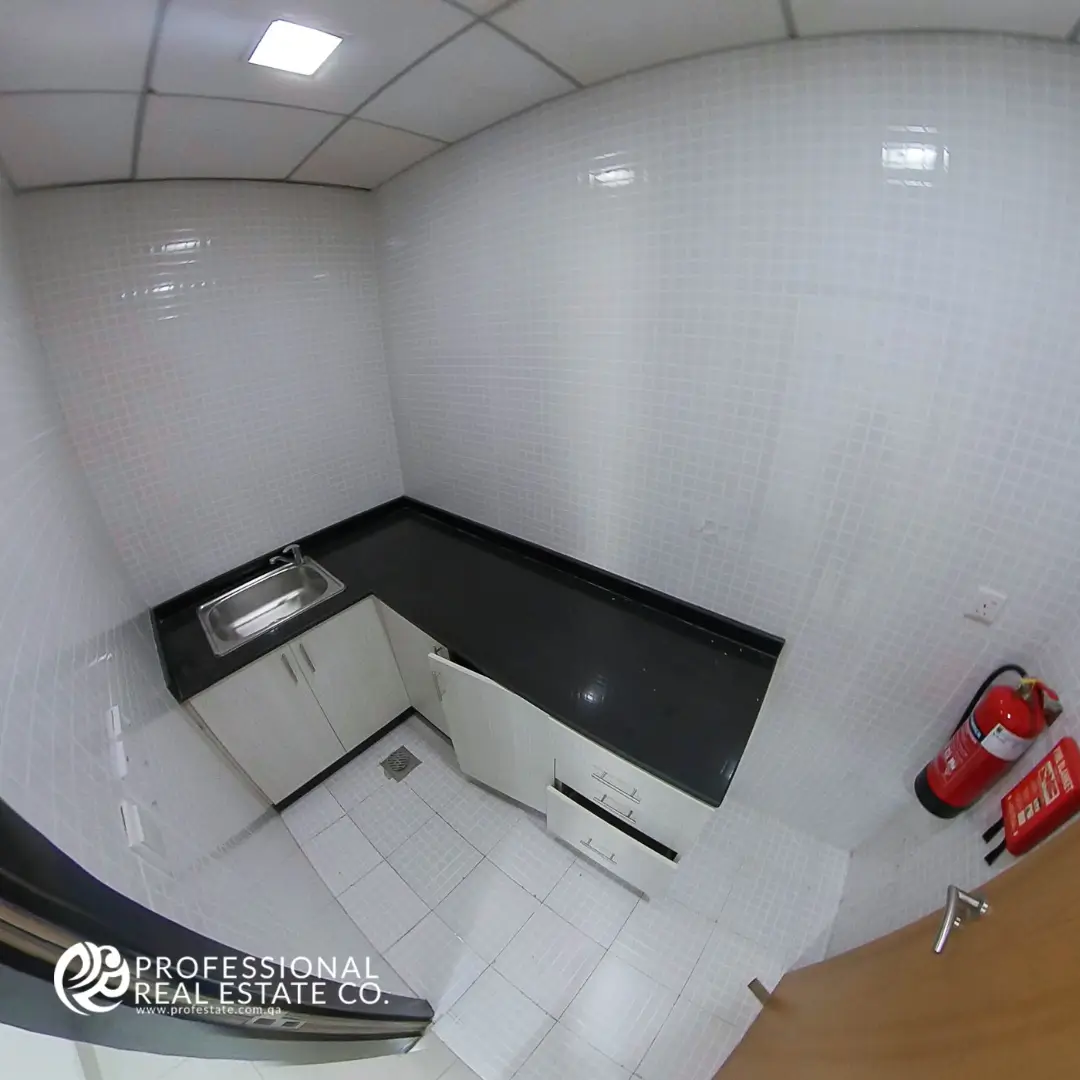 Compact office pantry in unfurnished open space in Bin Mahmoud, Doha
