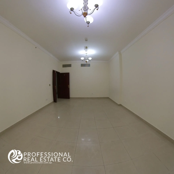 Living room alternative view facing main door in an unfurnished 3 BHK apartment in Bin Mahmoud, Doha